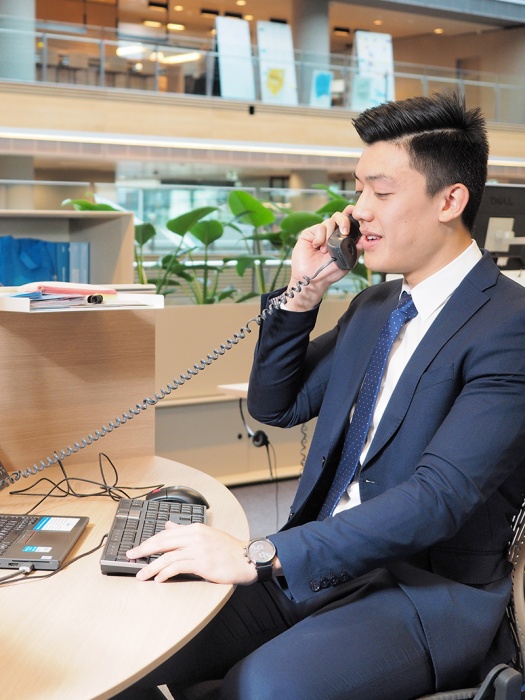 ANZ graduate on the phone