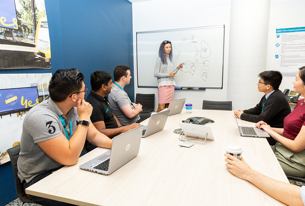 Optus Graduate Isobel Fraser in a meeting
