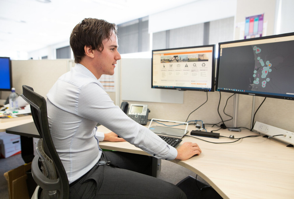 Josh working at his desk