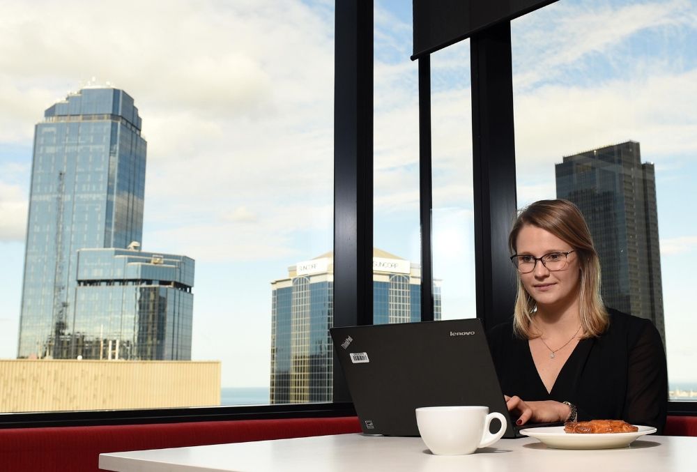 Day-in-the-life-Ashurst-Jessica-working-over-breakfast-on-her-desk