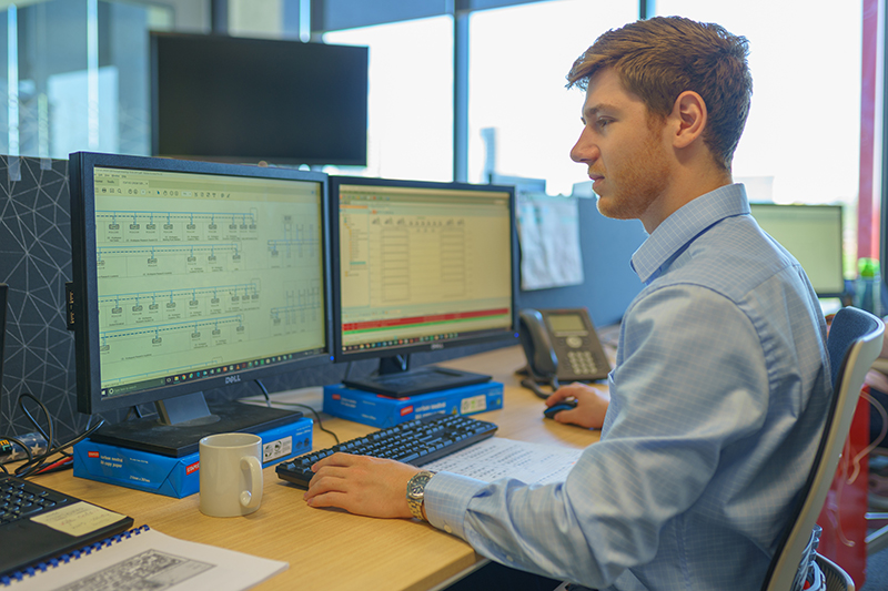 Day-in-the-life-Schneider-Electric-Chris-Johnson-work-on-desk