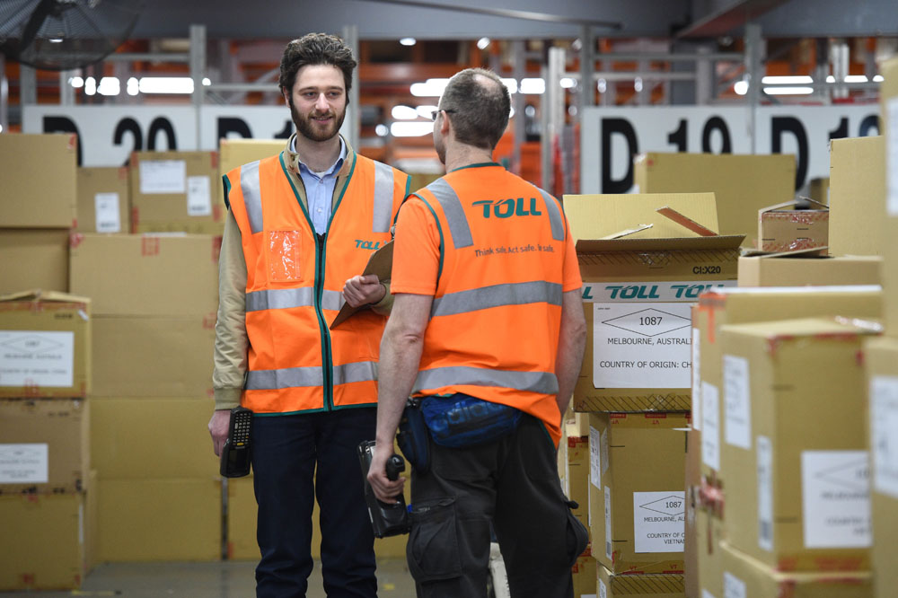 Day-in-the-life-Toll-Davies-Hugh-walk-the-floor-with-operations-manager