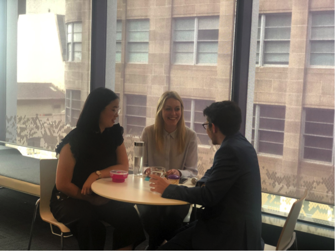 ASIC Sonja sits with two of her colleagues during lunch