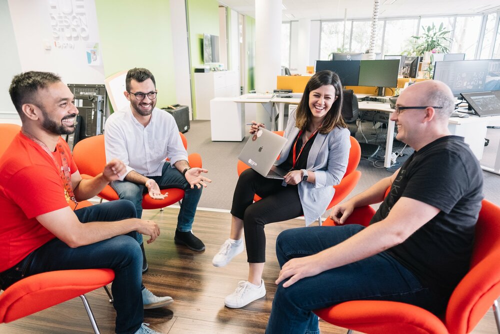 Professional having fun on their team meeting