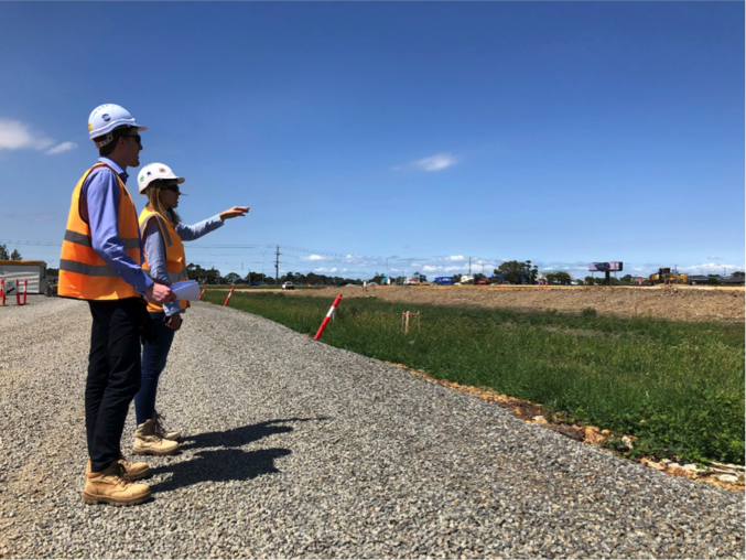 Two young professionals doing a site inspection