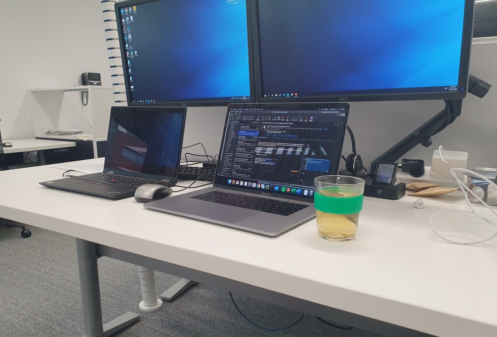 Capgemini Australia Graduate - A glass of chamomile tea on a computer desk.