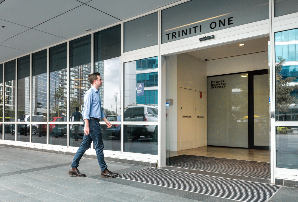 Downer Graduate- Young male professional going to the office.