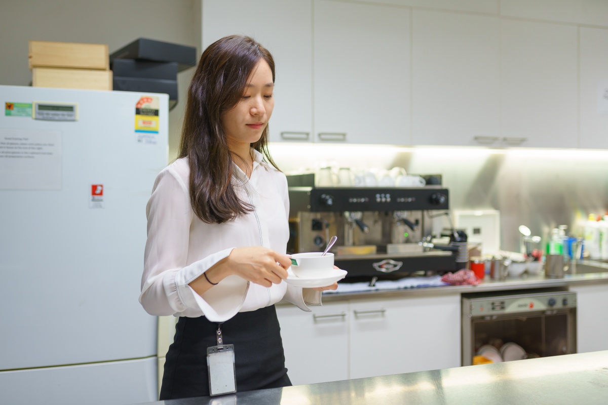 Thomson Geer Amy Jee having her morning tea
